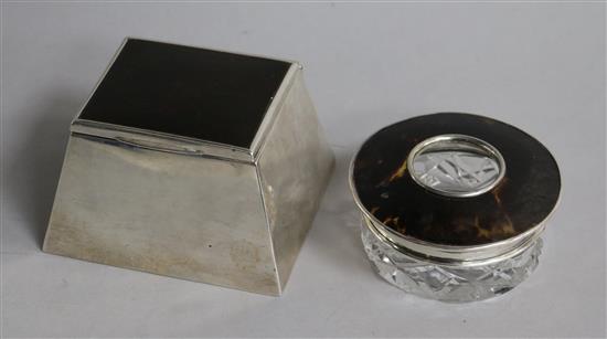 A 1920s/1930s silver and faux tortoiseshell mounted inkwell and a silver and tortoiseshell mounted glass hair tidy.